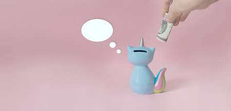 ceramic souvenir toy money box kitten Korn blue with colorful rainbow tail with unicorn horn on pink...