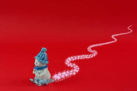 Christmas theme  bear skiing on red background with room for textの写真素材