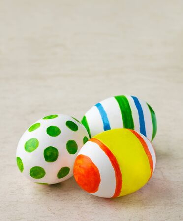 Closeup of three painted easter eggsの写真素材