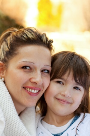 Mother and daughter in a park spending time together for mother's dayの写真素材