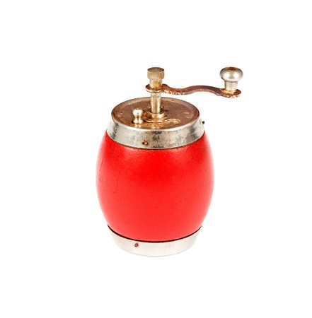 Red,russian antique,old and rusty pepper mill or grinder isolated on white backgroundの写真素材