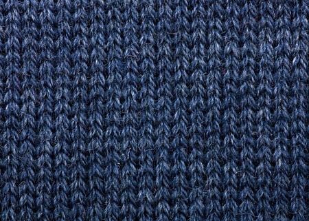 Macro detail of blue knitted wool texture or backgroundの写真素材
