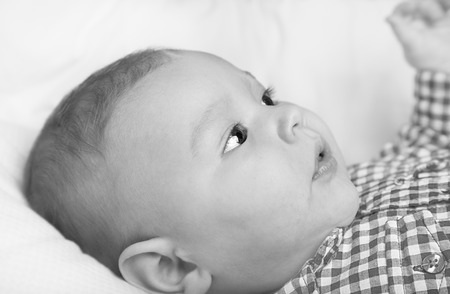 Black and white partrait of adorable infant baby boyの写真素材