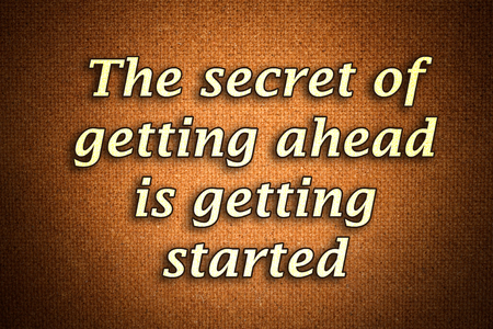 The secret of getting ahead is getting started.A famous inspirational motivating quote by Mark Twain.Grunge background with gradient effectの写真素材