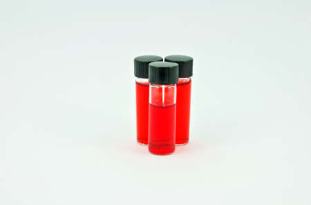 Red bottle of  isolated on whiteの写真素材