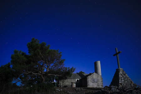 Old stone church st.John (sveti Ivan) at night in Losinj Island. Croatiaのeditorial素材