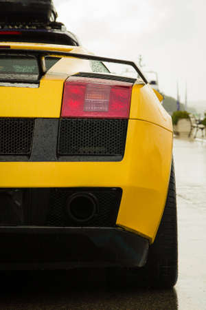 Yellow sports car - rear view