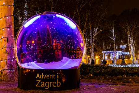 Zagreb, Croatia: 14th December 2018 / Decorated snow ball in Zrinjevac park, Zagreb Advent Best Christmas market in Europeのeditorial素材