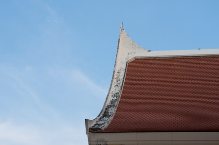 Thailand modern style aged roof in blue sky backgroundの写真素材