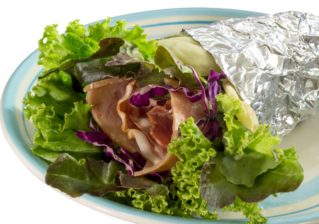 salad crape with ham bacon and vegetable on dishの写真素材
