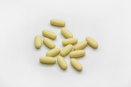 vitamin c pills isolated on white background