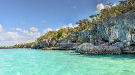 Clear tropical ocean water around large exotic rocksの写真素材