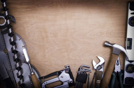Tools on a wooden backgroundの写真素材