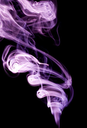 Colour smoke on a black backgroundの写真素材