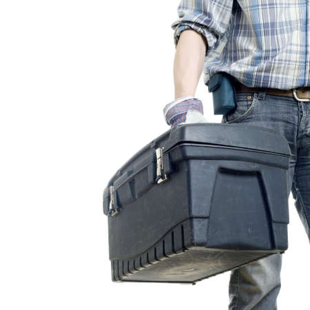 The builder with a box for instruments. The isolated white backgroundの写真素材