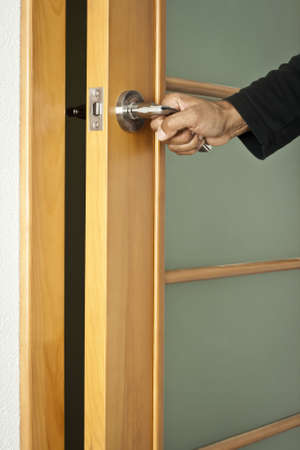The person opens an interroom doorの写真素材