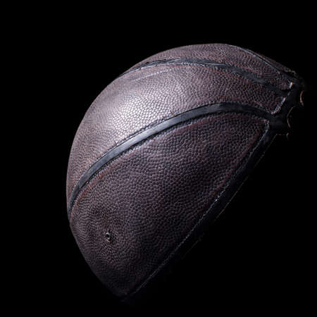 old basketball on a black backgroundの写真素材