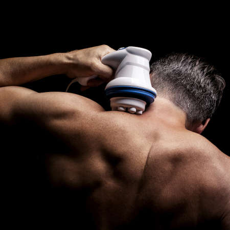 massager eliminates pain in the neckの写真素材