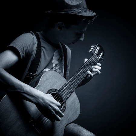 Young man playing the guitar