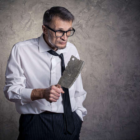 A man with a machete in his handの写真素材