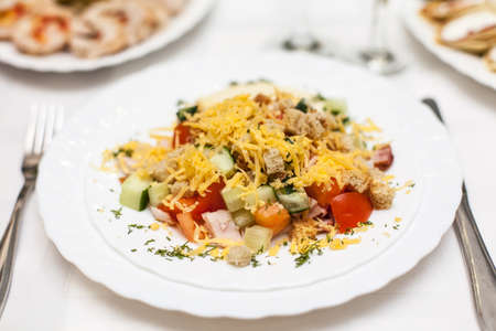salad on a white plate