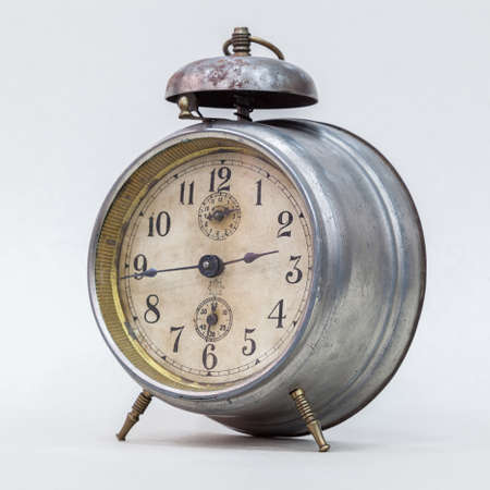 vintage alarm clock on a white background