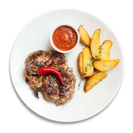 Lunch. Meat, baked potatoes, sauce