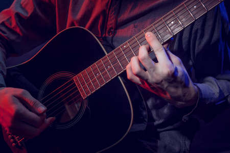 musician playing acoustic guitarの写真素材