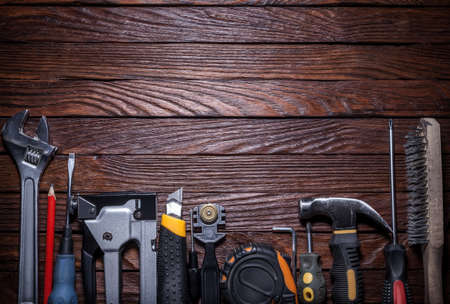 Tools on a wooden background