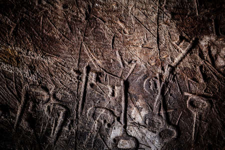 Old wooden surface with fingerprints of pressed keys