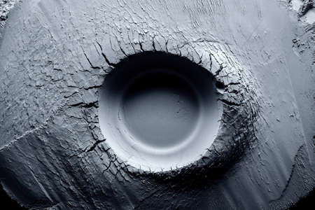 Dry plaster with uneven dents on the surface