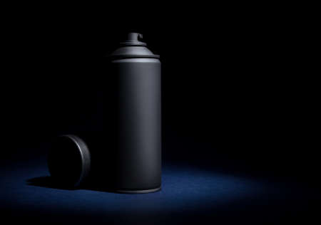 Spray can with spray paint on a black backgroundの写真素材