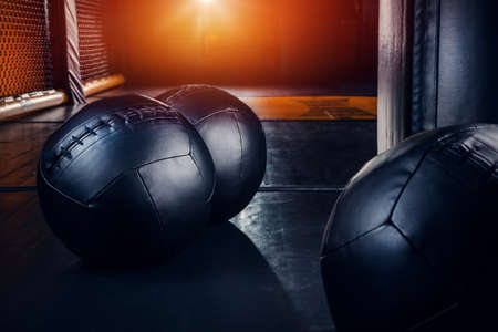 Black heavy weighted balls for gym workout.の写真素材