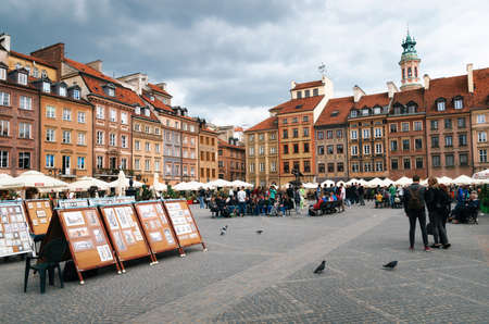 Warsaw, Poland - May 28, 2015: Paintings and pictures art for sale on the Old Town Market Place square.のeditorial素材
