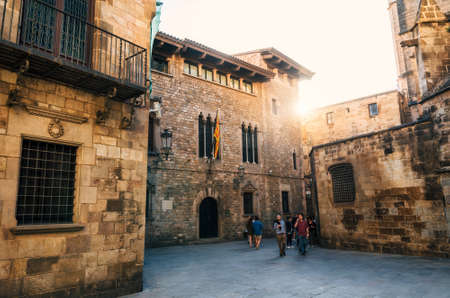 Barcelona, Catalunia, Spain - May 29, 2015: Tourist walk in Gothic quarter of Barcelona in summer at sunset. Crossing the Carrer del Paradis street and Carrer de la Pietat. The area near the Catedral de Barcelonaのeditorial素材