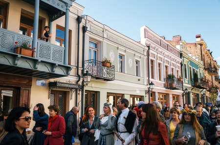 Tbilisi, Georgia - October 15, 2016: Architecture of Tbilisi centre on the background of People walk...