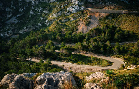 Winding road in mountain near Cape Formentor in Mallorca, Spainの写真素材