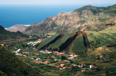 Valley of El Palmar and Las Lagunetas in the Teno mountain range with the hill like a sliced pie. Landmark of Tenerife, Canary Islandsの写真素材
