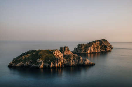 Majorca Santa Ponsa coastline at sunset in Morro d'en Pere Joan bay in Mallorca, Balearic islands of Spain. Es Malgrat rocks.の写真素材