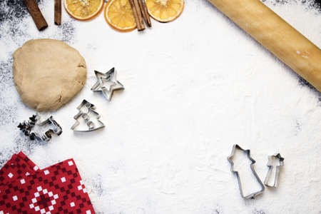 Cooking Christmas gingerbread cookies on a dark backgroundの写真素材