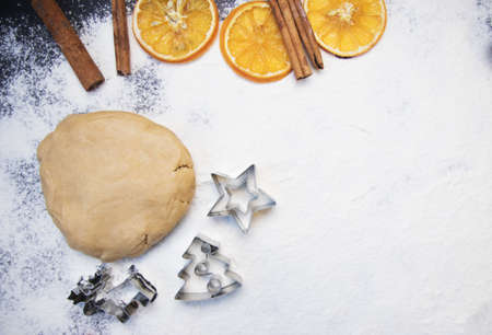 Cooking Christmas gingerbread cookies on a dark backgroundの写真素材