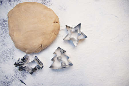 Cooking Christmas gingerbread cookies on a dark backgroundの写真素材