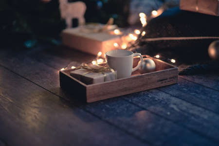 Chrismas concept cup of coffee, gift box balls,on the white backgroundの写真素材