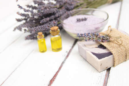Natural lavender soap with lavender flowers on itの写真素材