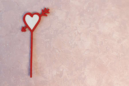 Handmade heart cupcake toppers on pink backgroundの写真素材