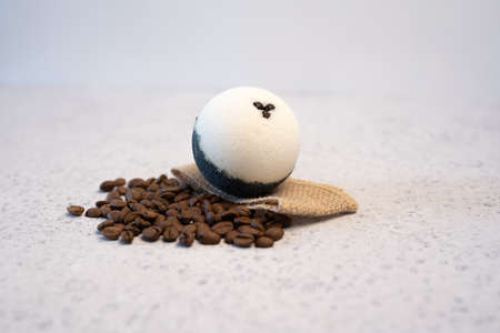 Bath bombs with coffee grains on a white backgroundの写真素材