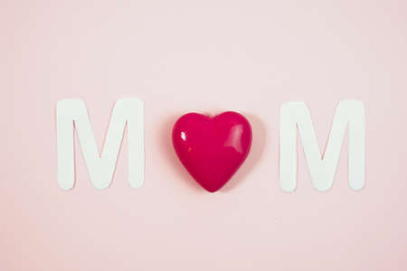 MOM Text with hearts on coloful backround.の写真素材