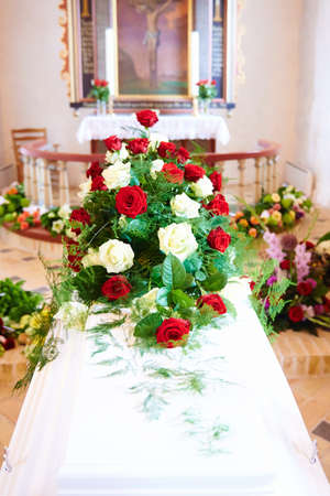 Flower arrangement on coffinの写真素材