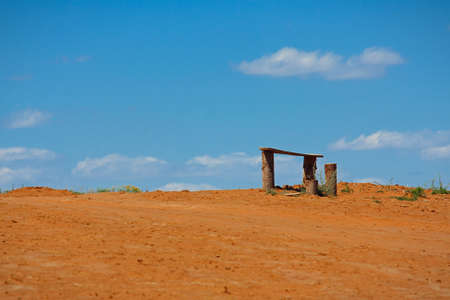 The lonely bench in summer asian steppeの写真素材