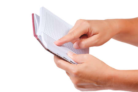 Open notebook for notes in the hands の写真素材